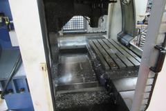 YCM Model XV Series 1020A 3-Axis CNC Vertical Machining Center, 10K Spindle, 24 Station SMTC, Chip Auger