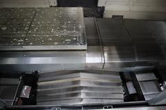 YCM Model NSV156A CNC Vertical Machining Center, Dual Chip Augers, Chip Conveyor