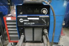 Miller XMT 304 CC/CV Multiprocessor Welder W Miller S52A Continuous Feed On Adjustable Boom
