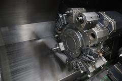Doosan Lynx 300M CNC Turning Center with Live Milling, 12 Station Turret, 10" 3-Jaw Chuck, Tailstock, Tool Presetter, Parts Catcher, Chip Conveyor