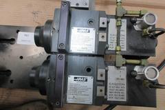 Haas HA2TS Twin Spindle Brushless 5C Indexer with Pneumatic Collet Closers and Pneumatic Tailstocks on Subplate.