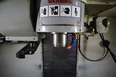 Haas VF-2SS CNC Vertical Machining Center, 12K Spindle, 4th Axis Brushless Drive with SHRT-160H Rotary Table, 24 Station SMTC, Probing, Chip Auger 