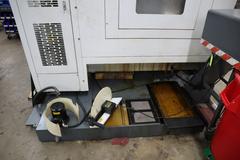 YCM Model NSV156A CNC Vertical Machining Center, Dual Chip Augers, Chip Conveyor