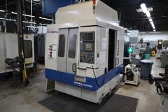 Daewoo Doosan 320/40 CNC Vertical Machining Center with 2 Station Pallet Changer, 12,000 RPM Spindle, 14 Station Rotary Turret, Chip Conveyor
