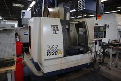 YCM Model XV Series 1020A 3-Axis CNC Vertical Machining Center, 10K Spindle, 24 Station SMTC, Chip Auger