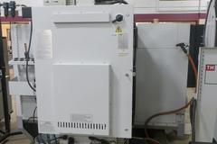 Haas VF-0 CNC Vertical Machining Center, Haas 32-Bit CNC Control, 4th Axis Drive, 20-Station Tool Changer, Programmable Coolant, Remote Jog Handle, Chip Auger 