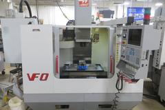 Haas VF-0 CNC Vertical Machining Center, Haas 32-Bit CNC Control, 4th Axis Drive, 20-Station Tool Changer, Programmable Coolant, Remote Jog Handle, Chip Auger 
