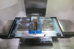 Haas VF-0 CNC Vertical Machining Center, Haas 32-Bit CNC Control, 4th Axis Drive, 20-Station Tool Changer, Programmable Coolant, Remote Jog Handle, Chip Auger 