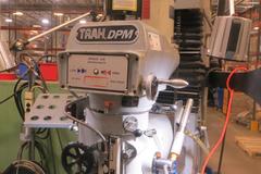 Southwest Industries Trak DPM 3-Axis CNC Vertical Bed Mill w Trak A.G.E 3 CNC Control, Kurt Power Draw Bar, 10" x 50" T-Slotted Table and MORE!