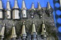 Cat 40 Taper Tool Holders (22) Including ER32, E16 Tool Holders, End Mills, and More