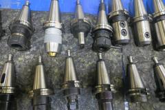 Cat 40 Taper Tool Holders (22) Including ER32, E16 Tool Holders, End Mills, and More