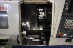 Daewoo Lynx 200LC CNC Turning Center, 8" 3-Jaw Chuck, 10 Station Turret, Tool Presetter, Tailstock, Chip Conveyor, Parts Catcher