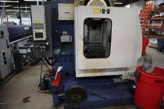 YCM Model XV Series 1020A 3-Axis CNC Vertical Machining Center, 10K Spindle, 24 Station SMTC, Chip Auger