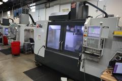 Haas VF-4SS 5-Axis CNC Vertical Machining Center,  12K RPM Spindle, 30 Station SMTC, TSC, Probing, Chip Auger, 4th and 5th Axis Drives with Haas TR-200Y Trunnion Table- NEW 2018