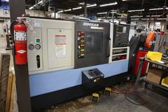 Doosan Lynx 300M CNC Turning Center with Live Milling, 12 Station Turret, 10" 3-Jaw Chuck, Tailstock, Tool Presetter, Parts Catcher, Chip Conveyor