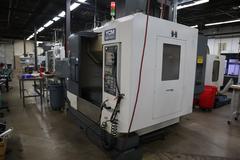 YCM Model NSV102A CNC Vertical Machining Center, 12K Spindle, 30 Station Side Mount ATC, Chip Conveyor