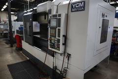YCM Model NSV156A CNC Vertical Machining Center, Dual Chip Augers, Chip Conveyor