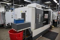 YCM Model NSV156A CNC Vertical Machining Center, Dual Chip Augers, Chip Conveyor