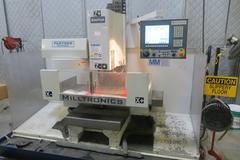 Milltronics Partner MM18 Vertical CNC Machining Center W Milltronics 7200 Control, 16 Station Carousel Tool Changer, Coolant Tank & Pump and MORE!