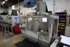 Haas VF-2SS CNC Vertical Machining Center, 12K Spindle, 4th Axis Brushless Drive with SHRT-160H Rotary Table, 24 Station SMTC, Probing, Chip Auger 