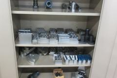 2 Door Metal Storage Cabinet with 6 Adjustable Shelves, with Contents of Lathe Jaws