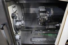 Doosan Lynx 300M CNC Turning Center with Live Milling, 12 Station Turret, 10" 3-Jaw Chuck, Tailstock, Tool Presetter, Parts Catcher, Chip Conveyor