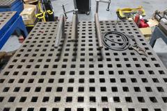 Acorn 5’ x 5’ Welding Table Platen with Adjustable Feet and Assorted Tooling