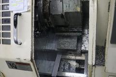 Okuma LB15 II CNC Lathe Turning Center, OSP700L CNC, 12 Station Turret, Tailstock, 8" Chuck, Chip Conveyor