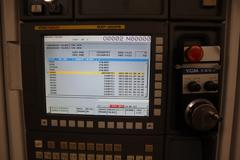 YCM Model NSV102A CNC Vertical Machining Center, 12K Spindle, 30 Station Side Mount ATC, Chip Conveyor