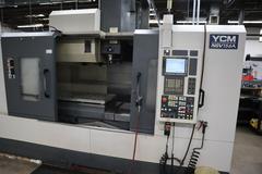YCM Model NSV156A CNC Vertical Machining Center, Dual Chip Augers, Chip Conveyor