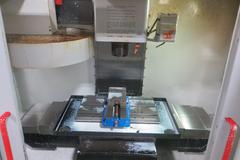 Haas VF-0 CNC Vertical Machining Center, Haas 32-Bit CNC Control, 4th Axis Drive, 20-Station Tool Changer, Programmable Coolant, Remote Jog Handle, Chip Auger 