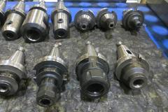 Cat 40 Taper Tool Holders (22) Including ER32, E16 Tool Holders, End Mills, and More