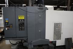 YCM Model NSV156A CNC Vertical Machining Center, Dual Chip Augers, Chip Conveyor