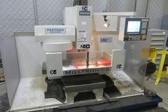Milltronics Partner MM18 Vertical CNC Machining Center W Milltronics 7200 Control, 16 Station Carousel Tool Changer, Coolant Tank & Pump and MORE!