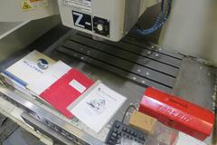 Milltronics Partner MM18 Vertical CNC Machining Center W Milltronics 7200 Control, 16 Station Carousel Tool Changer, Coolant Tank & Pump and MORE!