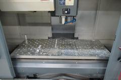 YCM Model NSV156A CNC Vertical Machining Center, Dual Chip Augers, Chip Conveyor