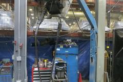 Miller XMT 304 CC/CV Multiprocessor Welder W Miller S52A Continuous Feed On Adjustable Boom