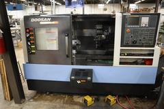 Doosan Lynx 300M CNC Turning Center with Live Milling, 12 Station Turret, 10" 3-Jaw Chuck, Tailstock, Tool Presetter, Parts Catcher, Chip Conveyor