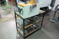 Work Table with 40 Taper Tool Vise and Contents including Large Assortment of Aluminum Vise Jaws