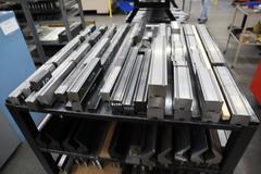 Press Brake Dies and Lower Die Holders for Amada Press Brakes on Welded Steel Shelving