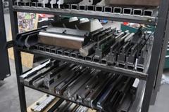 Amada Press Brake Dies, Ram Clamps and Lower Die Holders on Steel Rack