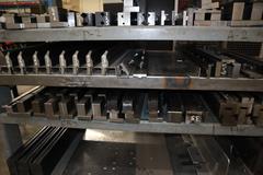 Press Brake Dies and Lower Die Holders Tall and Short for Amada Press Brakes on Welded Steel Shelving