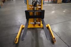 Uline H-5439 Electric Straddle Stacker Lift, 2,200# Cap, 63" Max Height, 50" Between Outriggers, 12 Volt Battery with Charger, 42" Forks