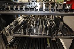 Amada Press Brake Dies, and Lower Die Holders on Welded Steel Shelving
