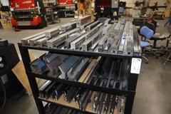 Press Brake Dies and Lower Die Holders for Amada Press Brakes on Welded Steel Shelving