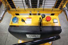 Uline H-2651 Electric Straddle Stacker Lift, 2,200# Cap, 63" Max Height, 50" Between Outriggers, 12 Volt Battery with Charger, 42" Forks