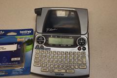 Brother PT-1880 Label Maker Battery Operated with Cassettes
