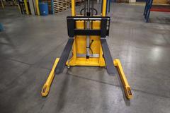 Uline H-5439 Electric Straddle Stacker Lift, 2,200# Cap, 63" Max Height, 50" Between Outriggers, 12 Volt Battery with Charger, 42" Forks