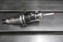 Doosan DNM 500 CNC Vertical Machining Center, 12K RPM Spindle, High Pressure Coolant, Renishaw Probing, Full 4th Axis, Chip Conveyor