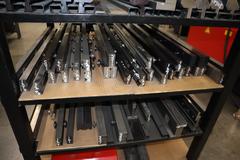 Press Brake Dies and Lower Die Holders for Amada Press Brakes on Welded Steel Shelving